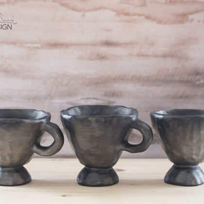 Black pottery mug for mulled wine