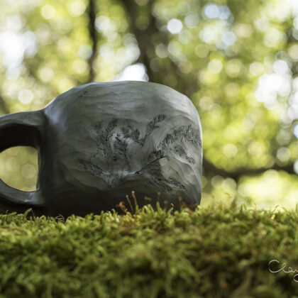 Black ceramic tea mug