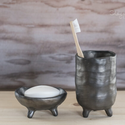 Bathroom accessories of black pottery