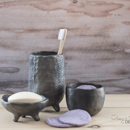 Modern and minimal. Black pottery for bath.
