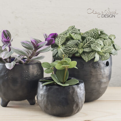 Black pottery pots for modern Nordic home. Minimalist.