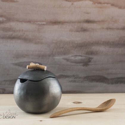 Handmade black ceramic pot for sugar with place for spoon