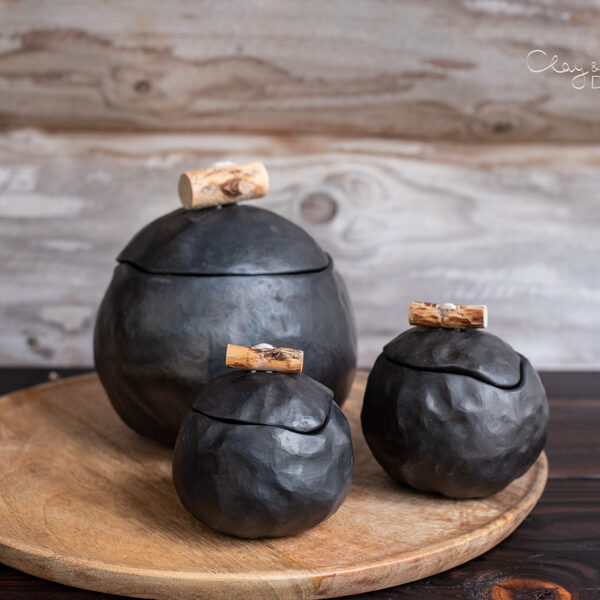 Black ceramic pots with covers