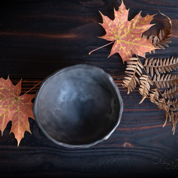 Handmade Textured Black Ceramic Bowl: Modern Nordic Centerpiece