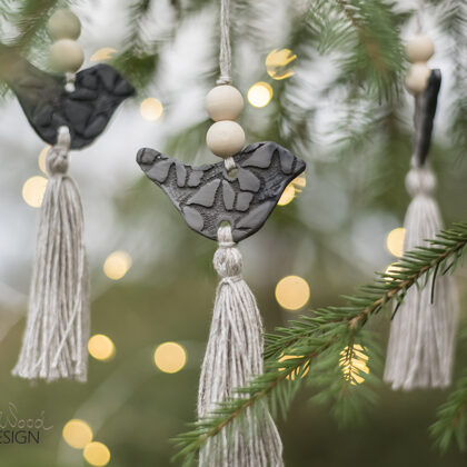 Black ceramic bird with wooden beads, linen tassel. Christmas gift tag. Home decors.
