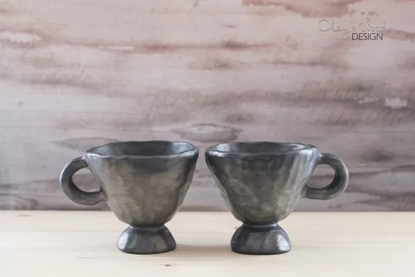 Black pottery mug for mulled wine