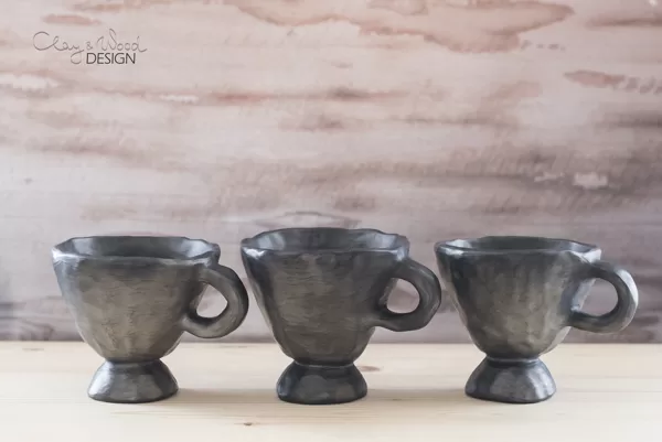 Black pottery mug for mulled wine