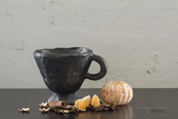 Black pottery mug for mulled wine