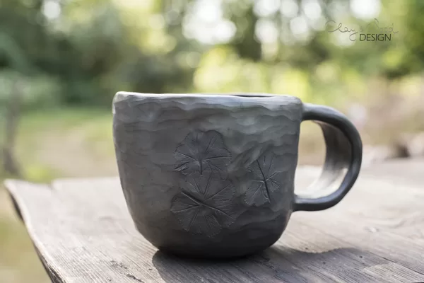Black ceramic tea mug