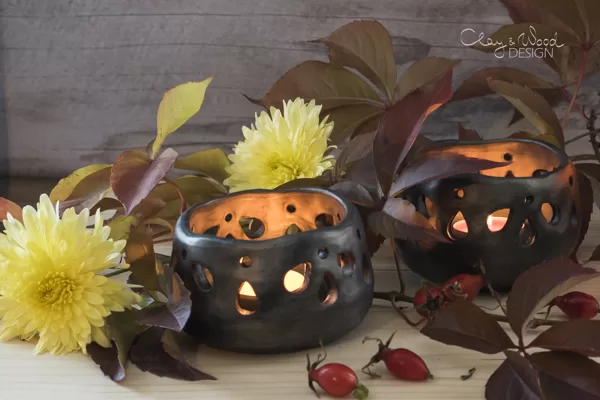 Black pottery candle holder