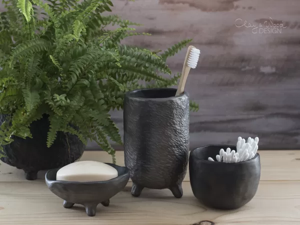 Handmade black pottery. Set for bathroom accessories