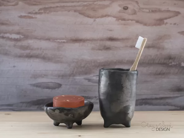 Black pottery for bathroom. Silvery black with uneven coloring.