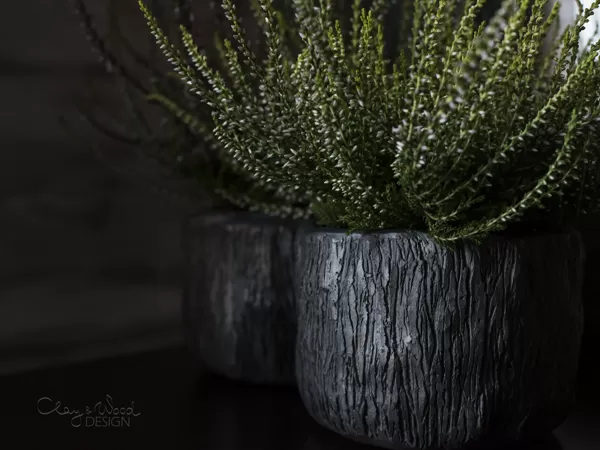 Black pottery planters. Nordic minimal design.