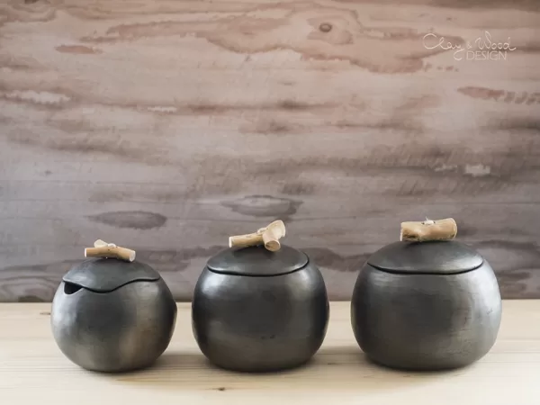 Handmade black pottery pots with lids