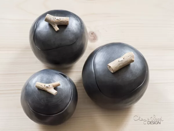 Handmade black ceramic pots with lids