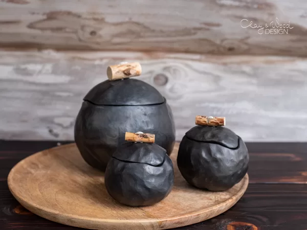 Black ceramic pots with covers