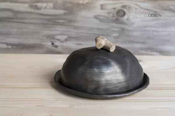 Black ceramic dish for butter. Black pottery. Modern. Minimalist.